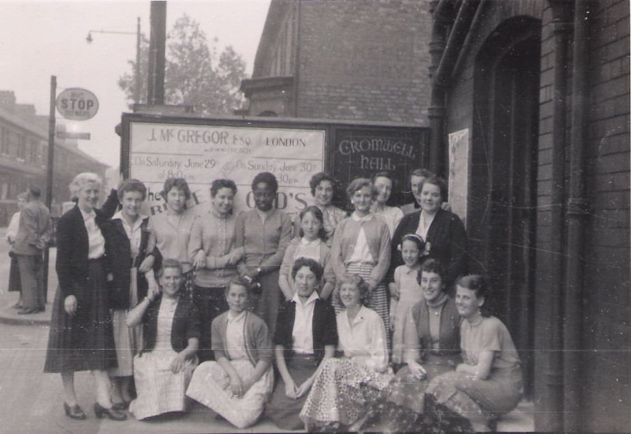 Group of ladies outside the entrance to Cromwell Hall above Estelle Modes taken circa 1957 just before the relocation